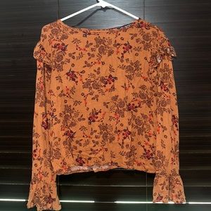This fall inspired blouse is a beautiful top for any fall season event!
